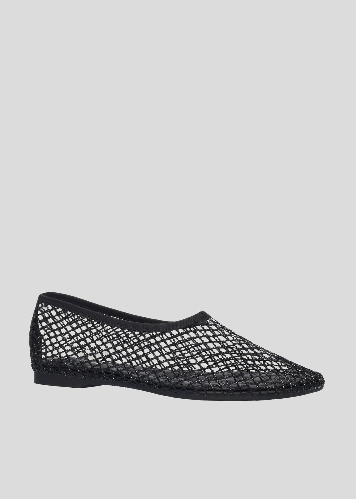 Vista lateral de las bailarinas de mesh con brillos para mujer Ruby Ballerina en color Negro, con punta redonda y tacón plano de 10 mm de Lola Cruz.